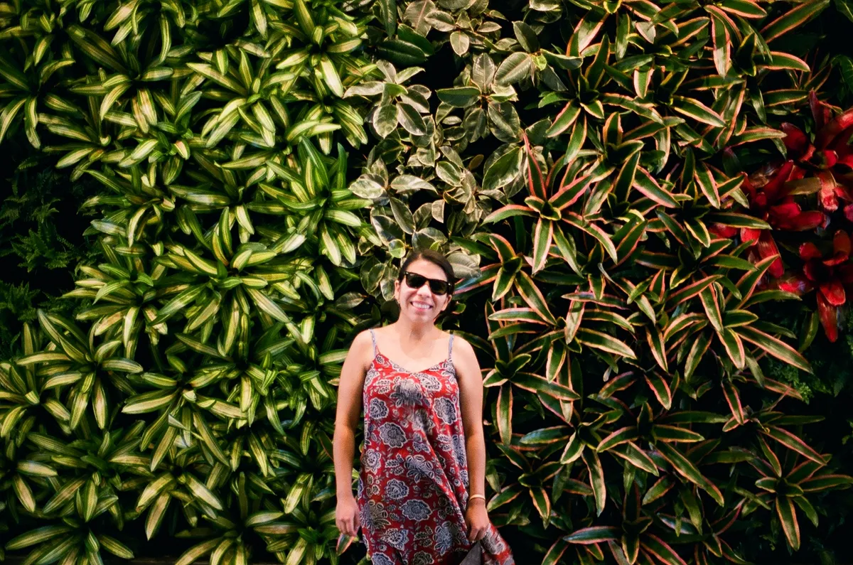 sandy in front of flowers at westin lobbby