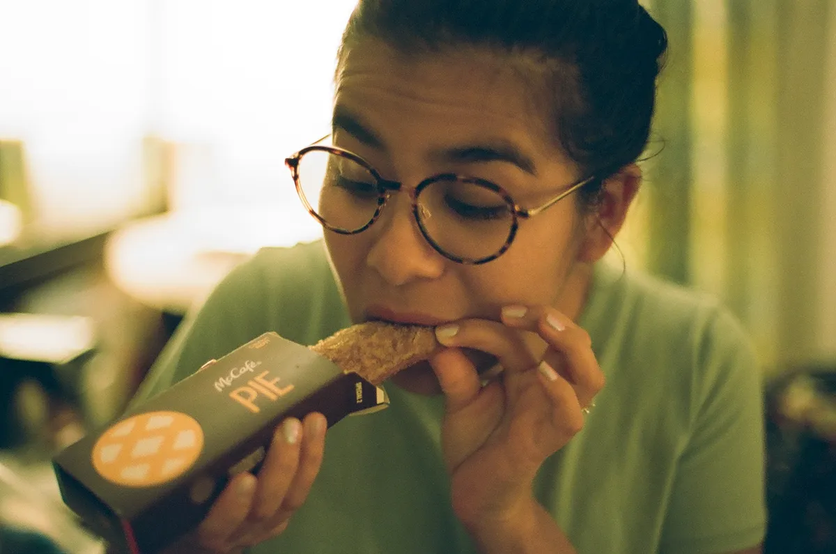 sandy eating mcdonalds apple pie